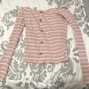 Over the shoulder long sleeve pink striped top.